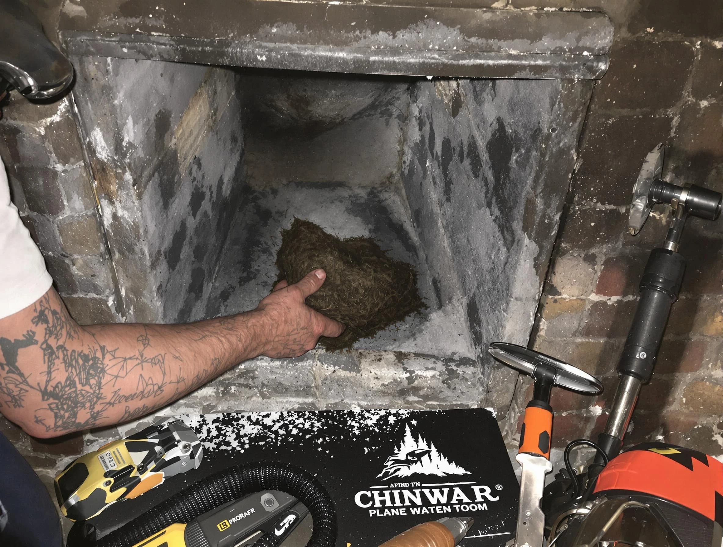 Kennedy Chimney Sweep safely removing debris and screening chimney in Kennedy, PA