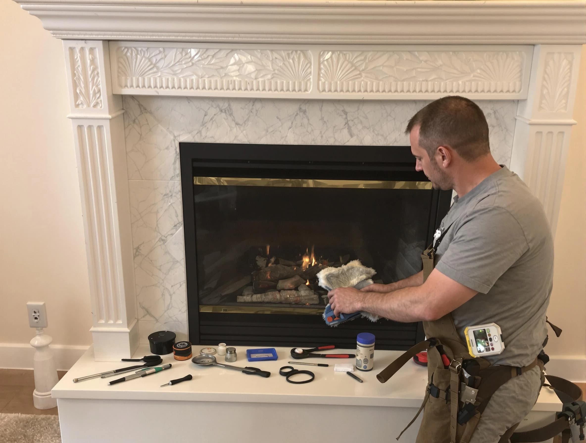 Kennedy Chimney Sweep performing fireplace maintenance in Kennedy, PA